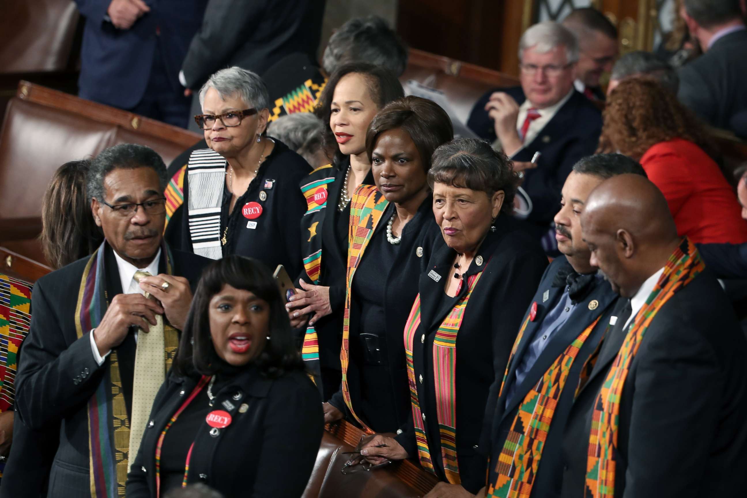 PHOTO: Members of Congress wear black clothing and Kente cloth in protest before the State of the Union address in the chamber of the U.S. House of Representatives Jan. 30, 2018 in Washington.