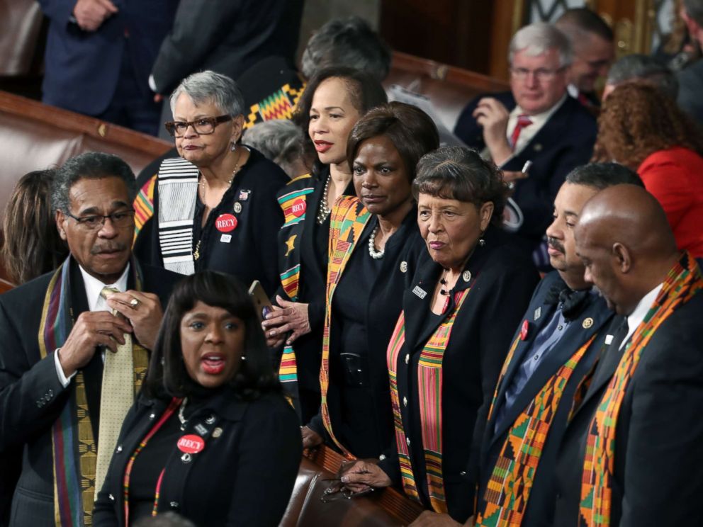 PHOTO: Members of Congress wear black clothing and Kente cloth in protest before the State of the Union address in the chamber of the U.S. House of Representatives Jan. 30, 2018 in Washington.