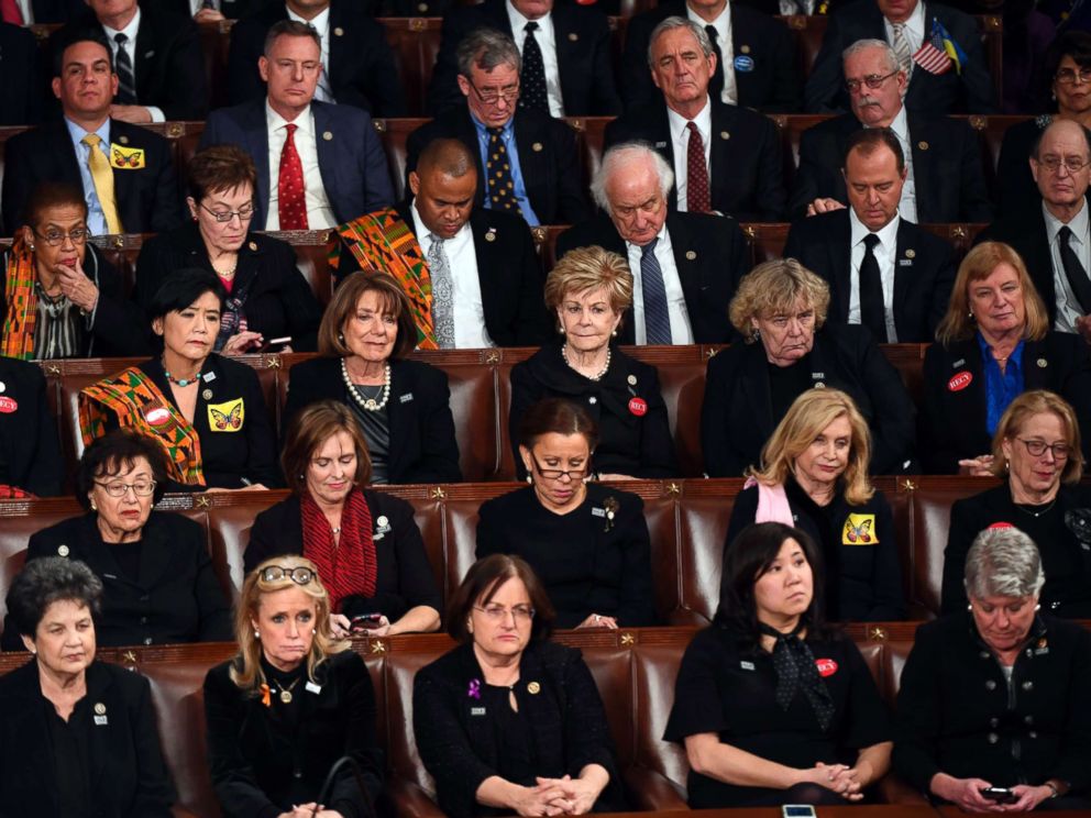 PHOTO: Democratic members of congress listen as President Donald Trump delivers the State of the Union address from the House chamber of the United States Capitol, Jan. 30, 2018.