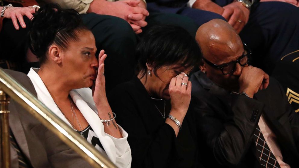 Elizabeth Alvarado, Robert Mickens, Evelyn Rodriguez, and Freddy Cuevas, parents of two girls who were chased down and murdered and whose deaths were among a string of 17 Long Island slayings that have been attributed to MS-13, cry as U.S. President Donald Trump introduces them during his State of the Union address in Washington, Jan. 30, 2018.