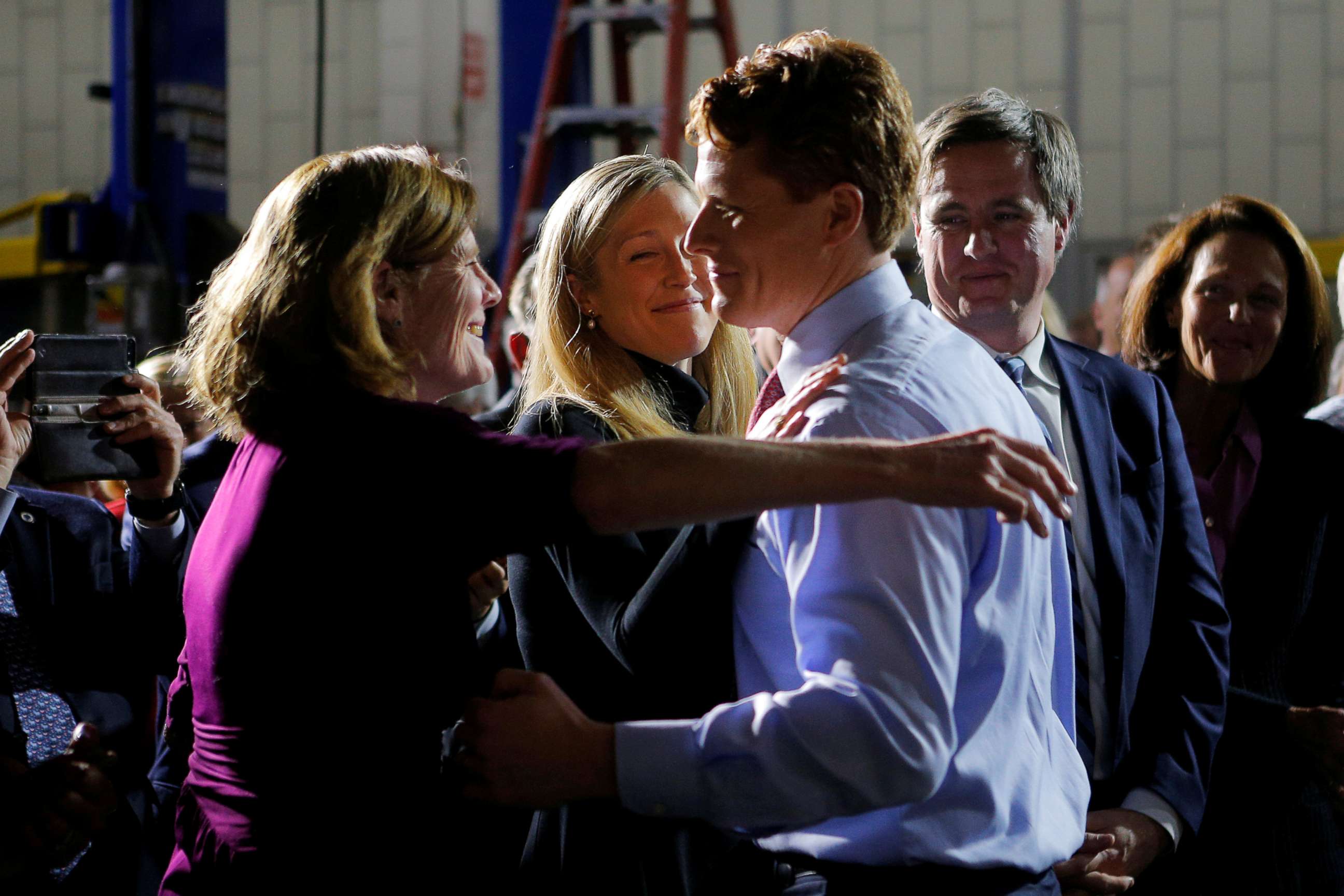 PHOTO: Rep. Joe Kennedy III hugs his wife Lauren and his mother Sheila Rauch after delivering the Democratic rebuttal to President Donald Trump's State of the Union address in Fall River, Mass., Jan. 30, 2018.