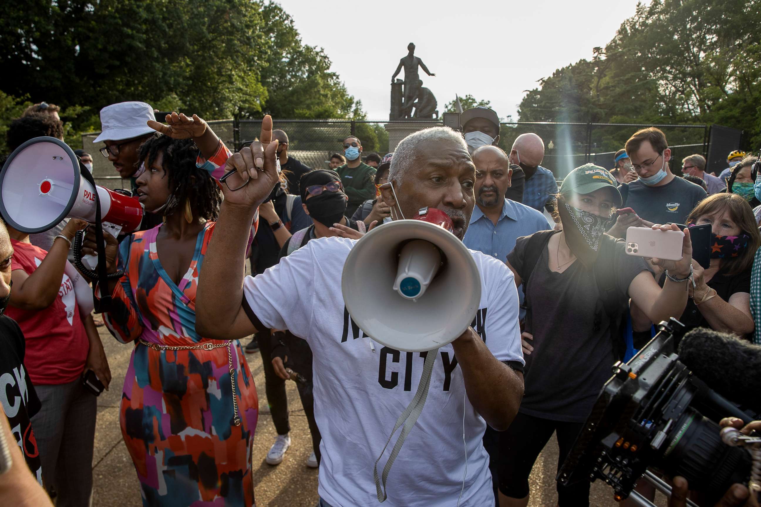 PHOTO: Protesters for and against the removal of the Emancipation Memorial debate in Lincoln Park on June 26, 2020 in Washington, DC.