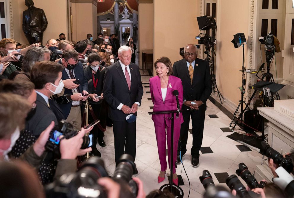 PHOTO: Speaker of the House Nancy Pelosi, D-Calif., center, flanked by House Majority Leader Steny Hoyer, D-Md., left, and House Majority Whip James Clyburn, D-S.C., at the Capitol, Nov. 5, 2021. 