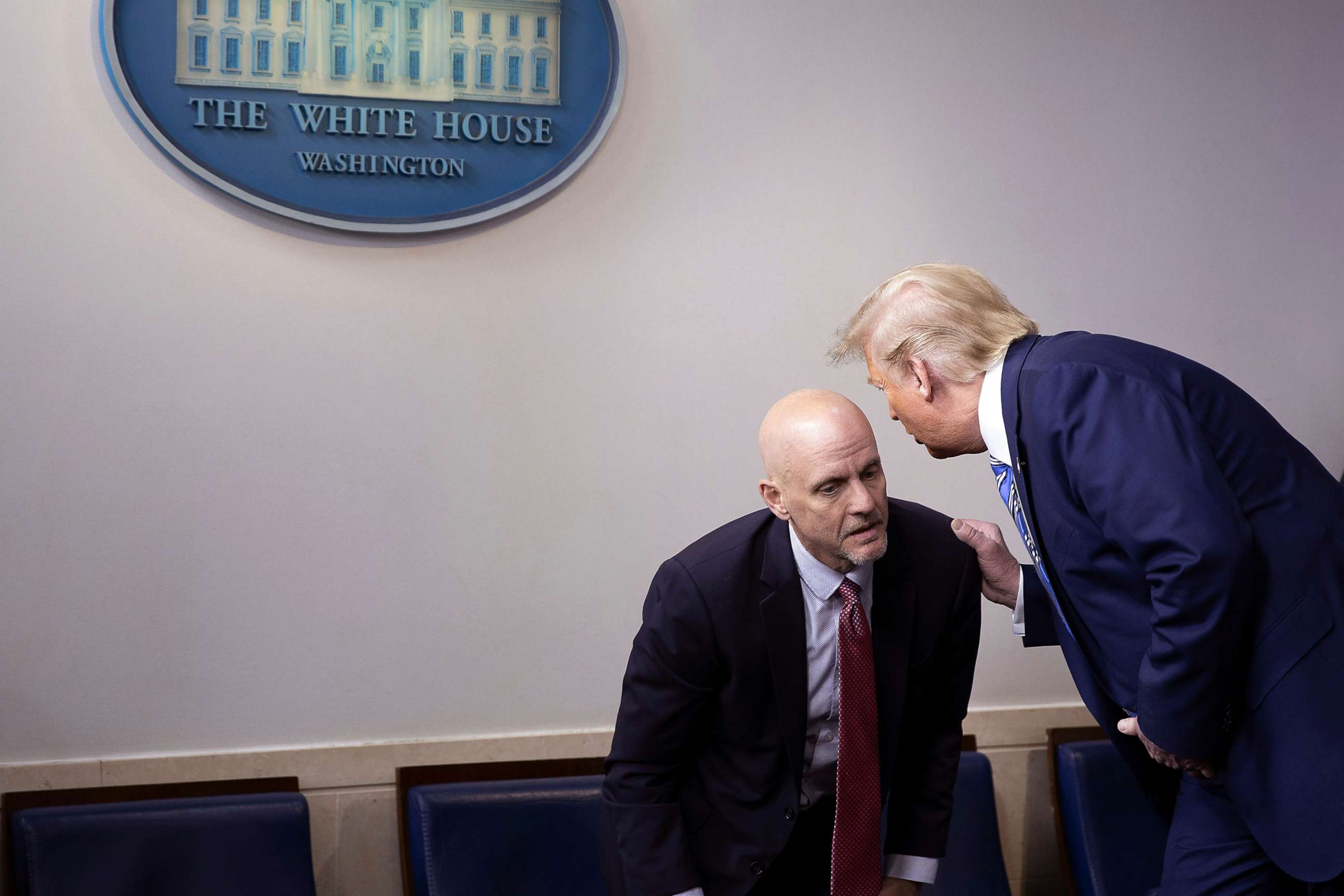 PHOTO: Commissioner of the FDA, Stephen Hahn listens to President Donald Trump during a coronavirus briefing at the White House on April 19, 2020, in Washington.