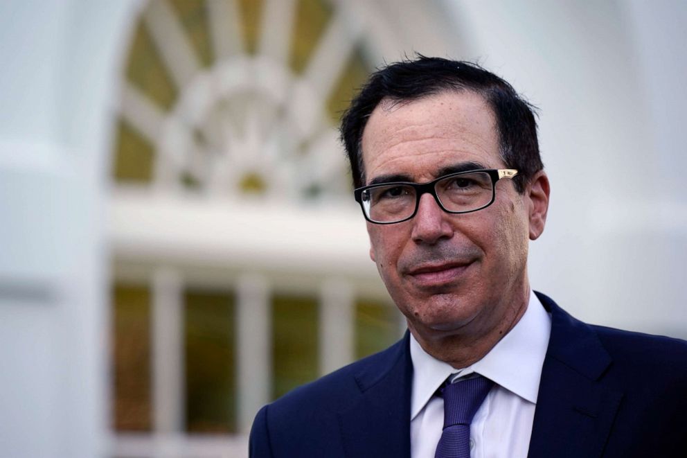 PHOTO: Treasury Secretary Stephen Mnuchin arrives at the White House, Aug. 24, 2020, in Washington.