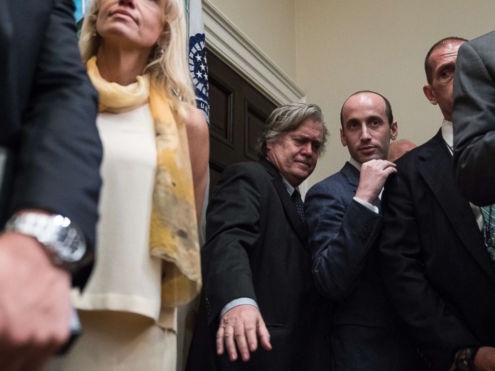 PHOTO: Steve Bannon stands with other senior White House staff as President Donald Trump and others unveil legislation to place new limits on legal immigration in the Roosevelt Room of the White House in Washington, Aug 02, 2017.