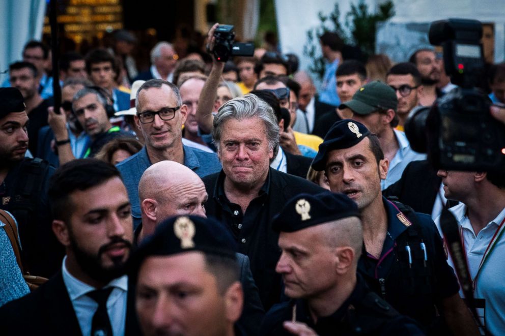 PHOTO: Former White House Chief Strategist Steve Bannon makes his way through crowds surrounded by his entourage after speaking at Atreju 2018, a conference of right-wing activists, Sept. 22, 2018, in Rome, Italy.