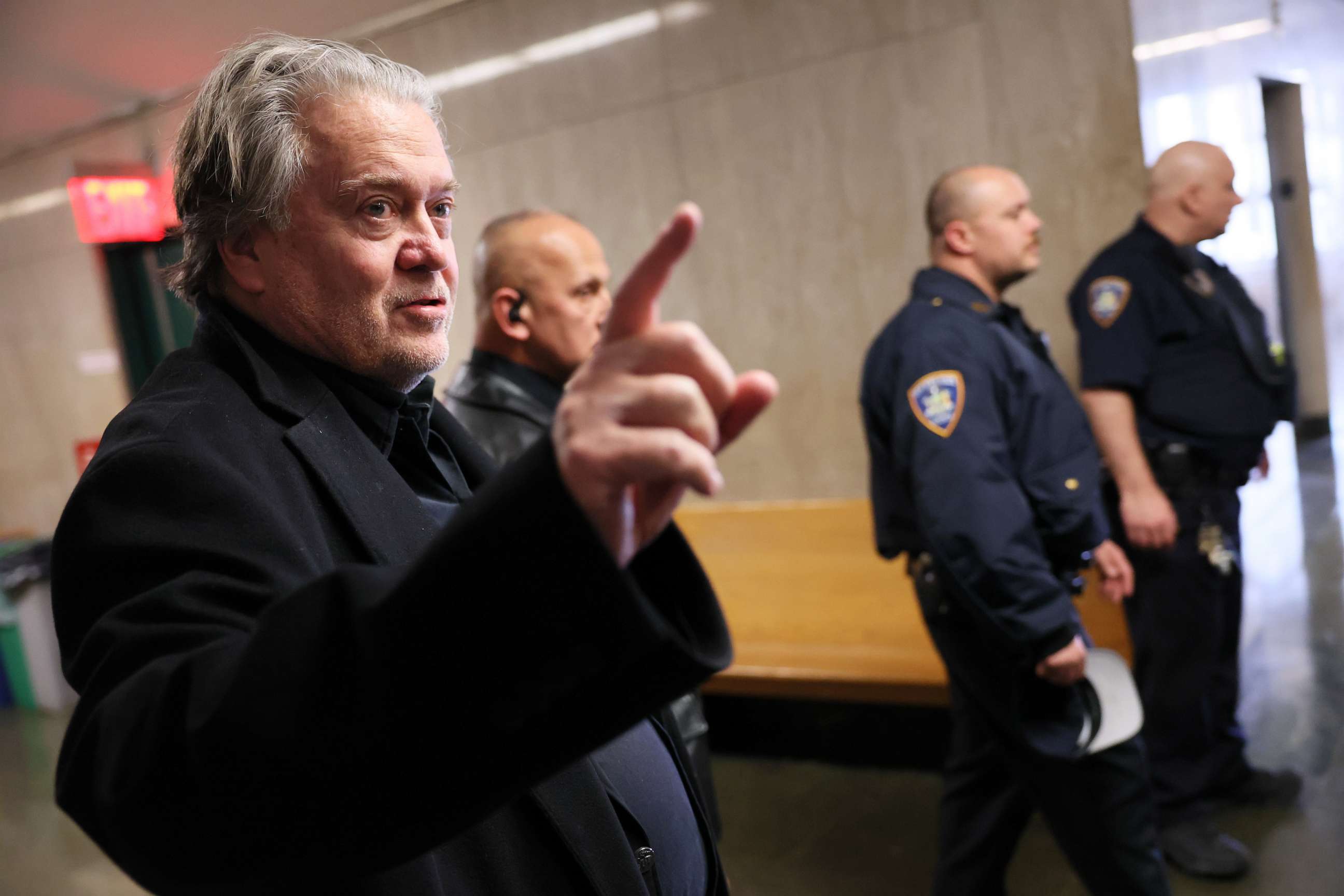 PHOTO: Steve Bannon, former adviser to President Donald Trump, points as he speaks after leaving a court appearance at NYS Supreme Court on Feb. 28, 2023, in New York City.