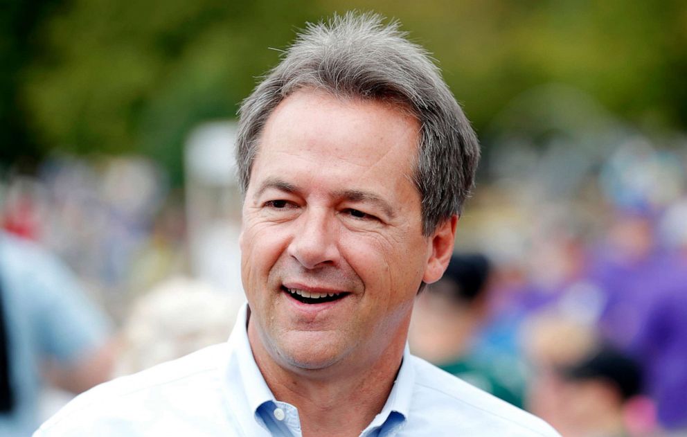 PHOTO: Montana Gov. Steve Bullock walks down the main concourse during a visit to the Iowa State Fair, Thursday, Aug. 16, 2018, in Des Moines, Iowa.