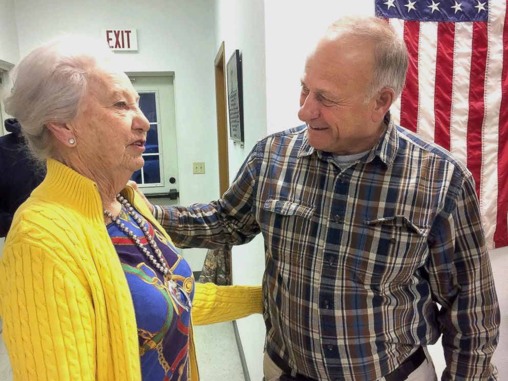 PHOTO: Precinct official Elaine Rex, of Odebolt, Iowa, talks with U.S. Rep. Steve King, of Kiron, Iowa, at the Odebolt Fire Station, where King cast the precinct's first vote in the mid-term election in Odebolt on Tuesday, Nov. 6, 2018.