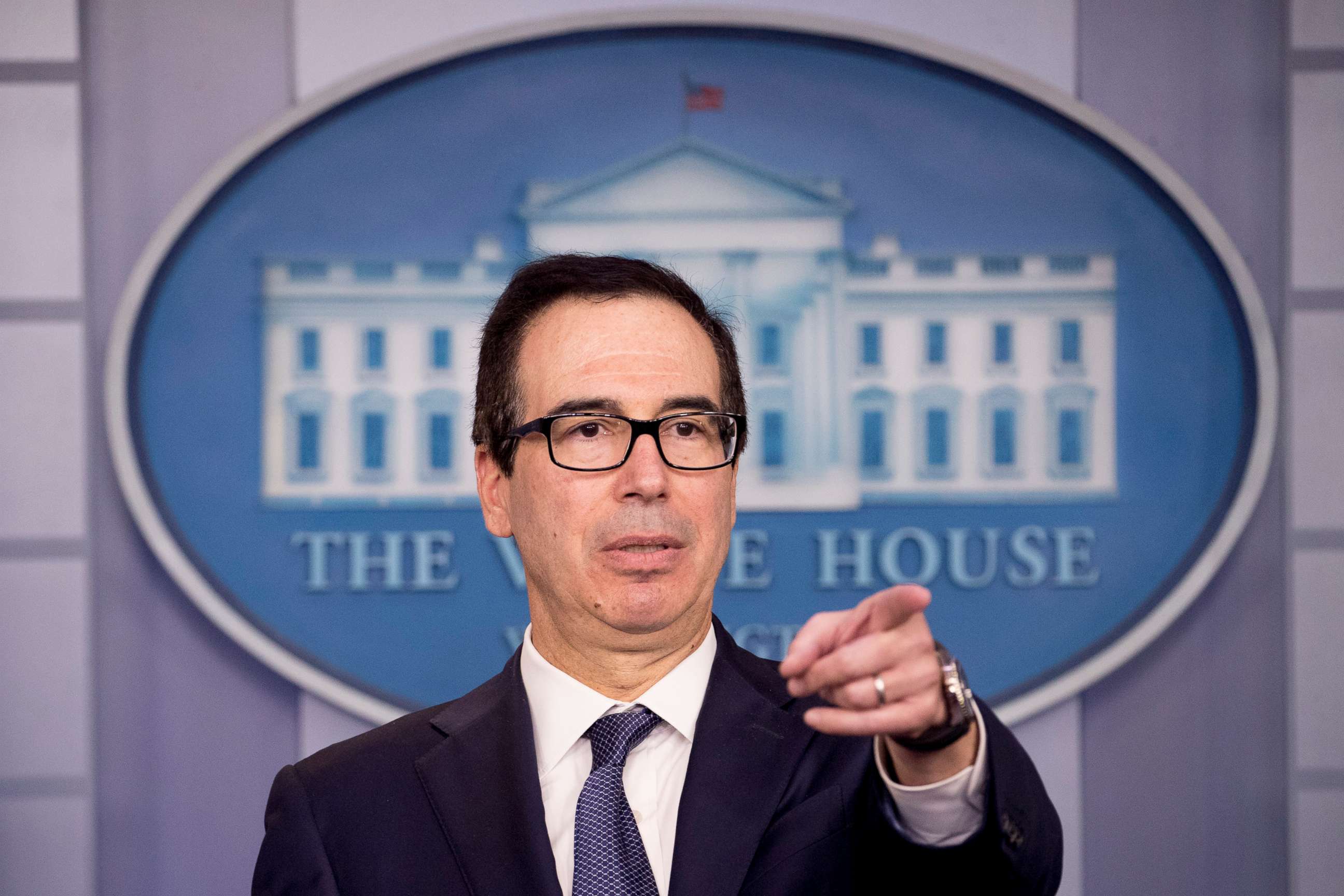 PHOTO: Treasury Secretary Steven Mnuchin takes a question from a reporter after announcing the threat of sanctions on Turkey in the Briefing Room of the White House in Washington, Oct. 11, 2019.