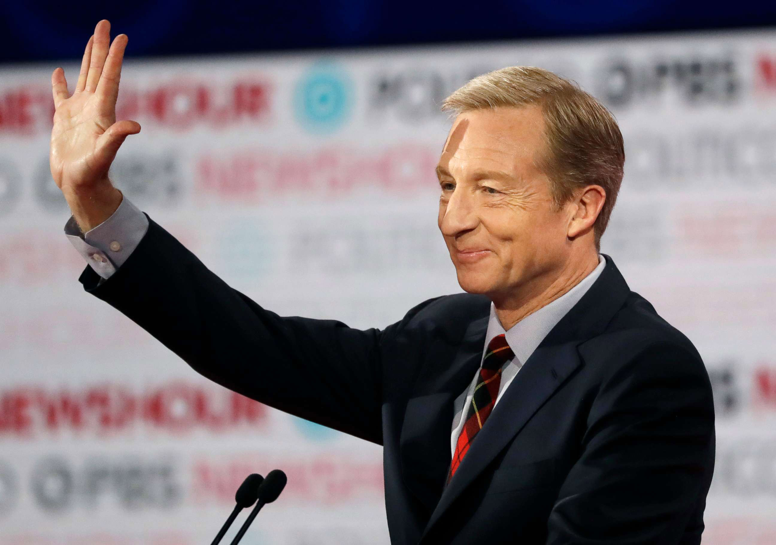 PHOTO: In this Dec. 19, 2019, file photo, Democratic presidential candidate businessman Tom Steyer waves before a Democratic presidential primary debate in Los Angeles, Calif.