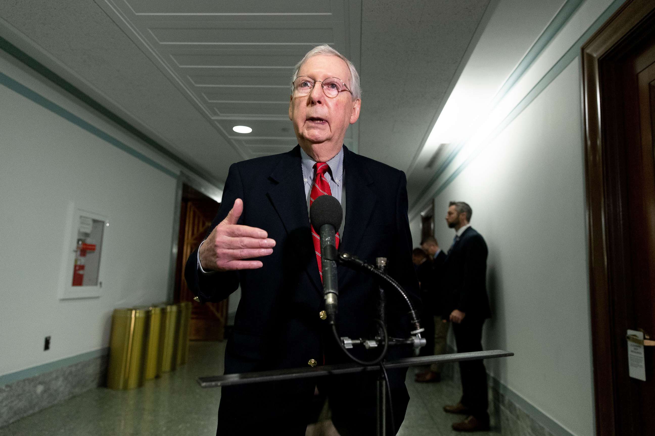 PHOTO: Senate Majority Leader Mitch McConnell delivers remarks to the media before attending a closed-door Senate Republican luncheon on Capitol Hill, in Washington, DC, March 21, 2020. 