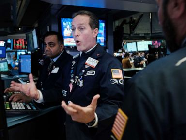 As stocks dive and coronavirus spreads, Trump repeats risk from COVID-19 is 'low'