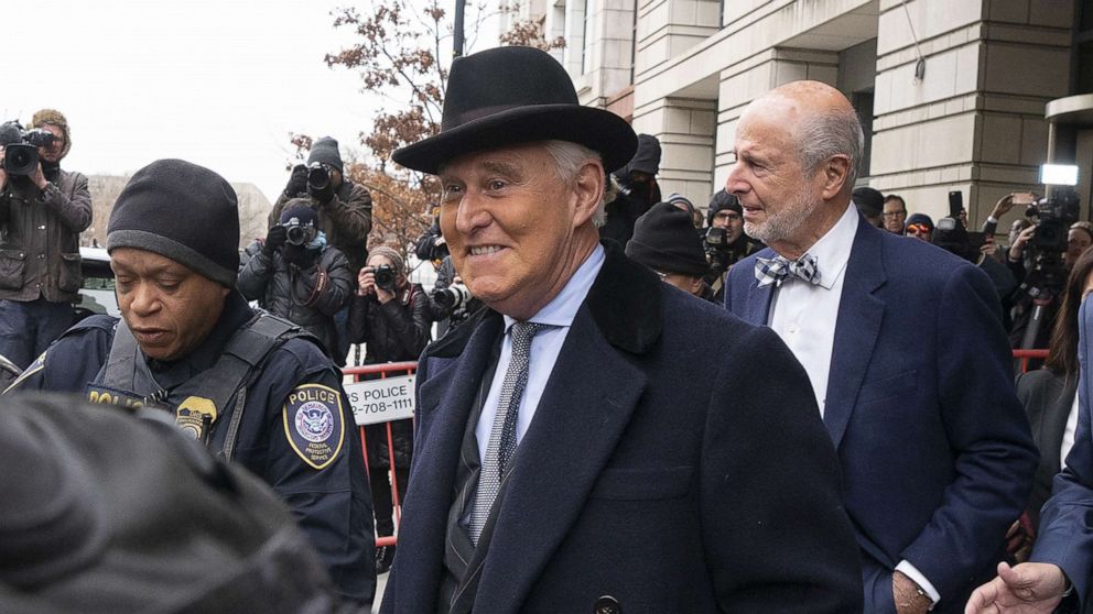 PHOTO: Roger Stone, former adviser to Donald Trump's presidential campaign, center, exits federal court in Washington, D.C., U.S., on Thursday, Feb. 20, 2020.