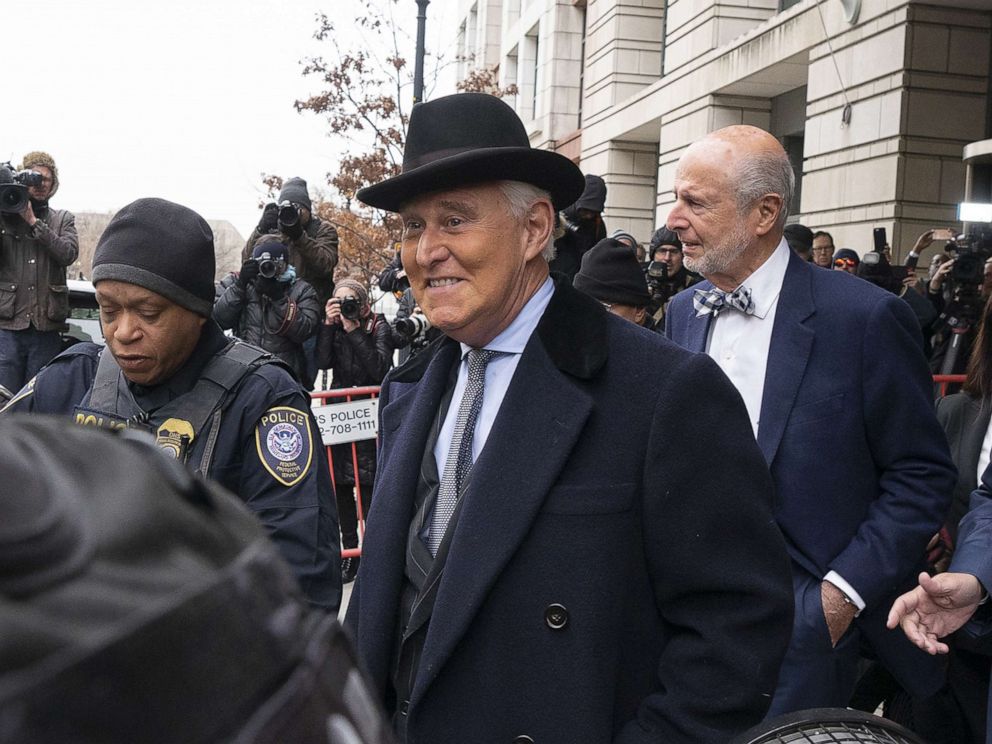 PHOTO: Roger Stone, former adviser to Donald Trump's presidential campaign, center, exits federal court in Washington, D.C., U.S., on Thursday, Feb. 20, 2020.