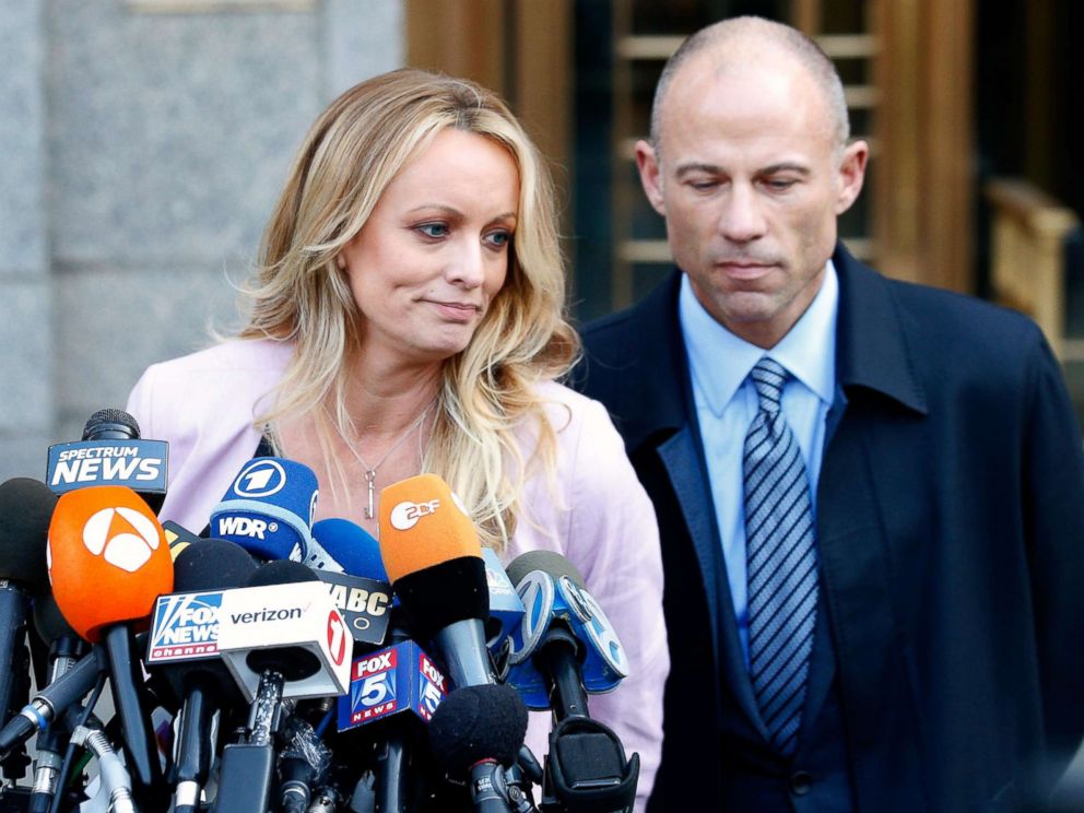 PHOTO: Adult film actress Stephanie Clifford, also known as Stormy Daniels, speaks to media along with lawyer Michael Avenatti (R) outside federal court in New York, April 16, 2018.
