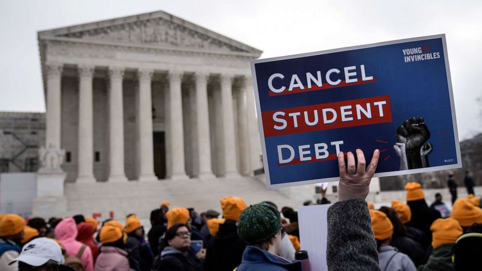 PHOTO: People gather in support of the Biden administration's student debt relief plan in front of the Supreme Court, February 28, 2023.