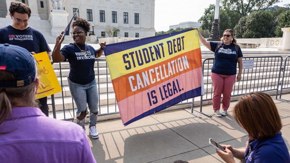 PHOTO: Demonstrators in favor of student loan debt forgiveness outside the US Supreme Court in Washington, DC, June 30, 2023.