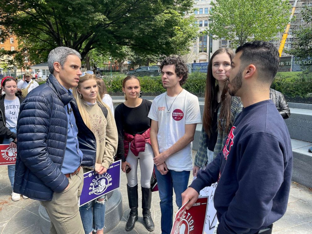 PHOTO: Liberty University students speak with ABC News outside the state capitol in Richmond, Va., ahead of an anti-abortion march in April 2022.