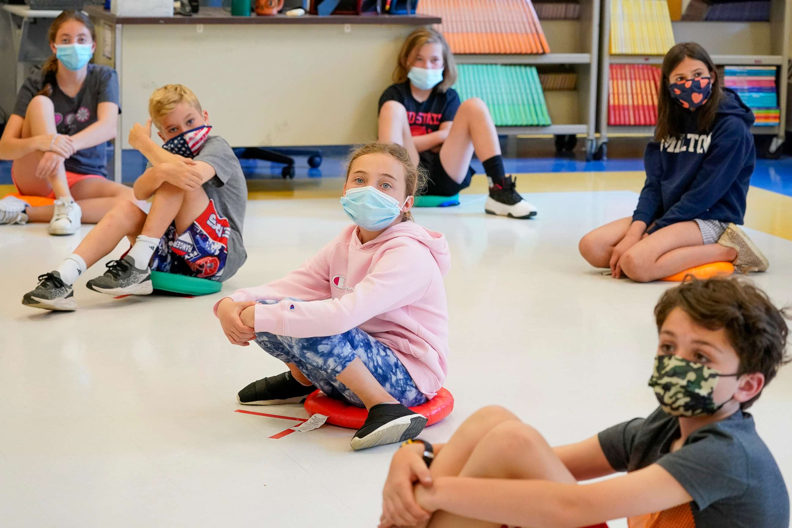 PHOTO: Fifth graders wearing face masks are seated at proper social distancing during a music class at the Milton Elementary School in Rye, N.Y., May 18, 2021.