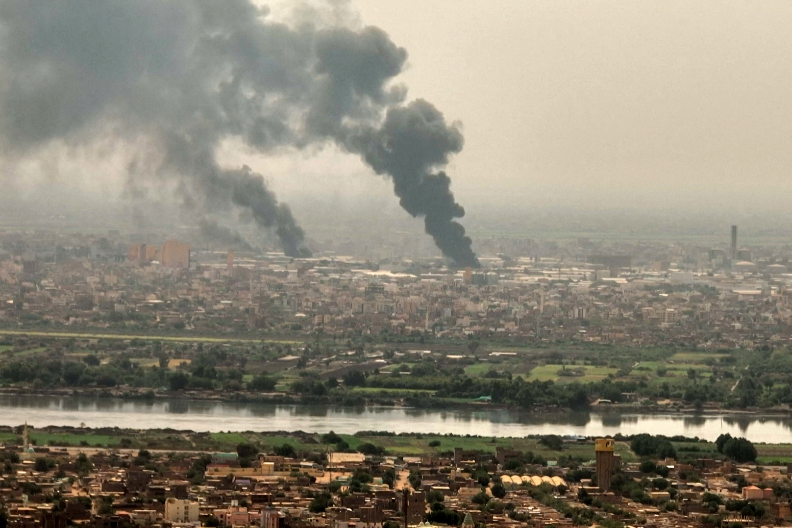 PHOTO: This image grab taken from AFPTV video footage on April 28, 2023, shows an aerial view of black smoke rising over Khartoum.