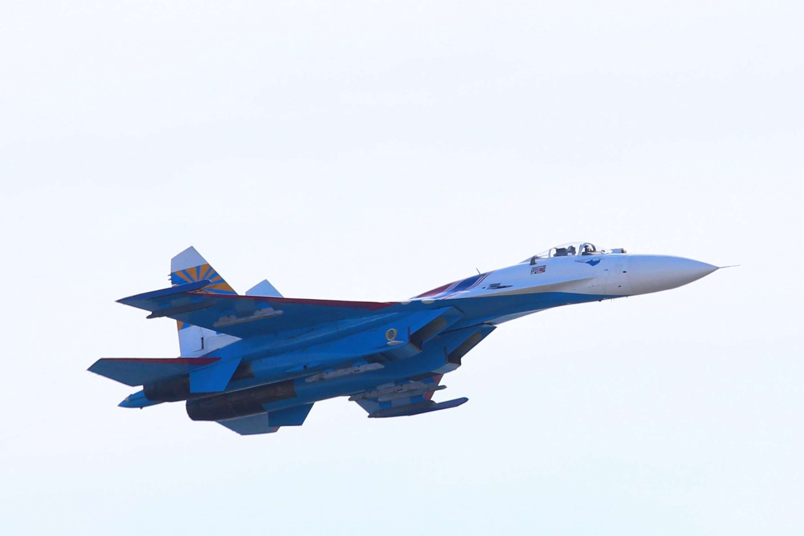 PHOTO: Russian Knights flying Sukhoi Su-27s perform aerobatic maneuvers during their show over Saint-Petersburg, Russia on April 25, 2015.