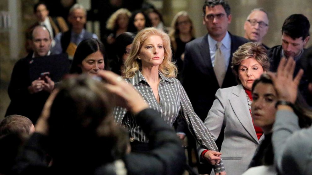 In this file photo, Summer Zervos, a former contestant on The Apprentice, leaves New York State Supreme Court with attorney Gloria Allred (R) after a hearing on the defamation case against President Donald Trump in Manhattan, New York City, Dec. 5, 2017.