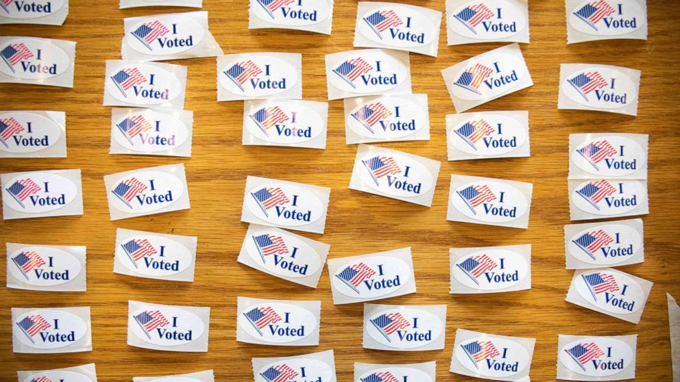 PHOTO: "I Voted" stickers cover a table at a polling station during the North Carolina primary on Super Tuesday in Charlotte, N.C. on March 3, 2020.