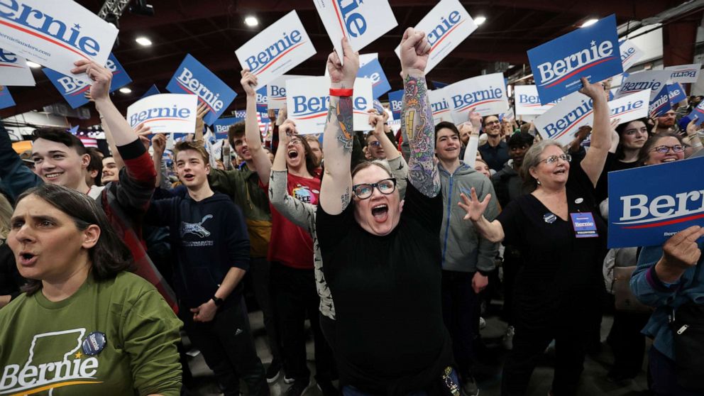 PHOTO: Supporters of Democratic presidential candidate Sen. Bernie Sanders cheer for early results at his Super Tuesday night rally in Essex Junction, Vt., March 3, 2020.