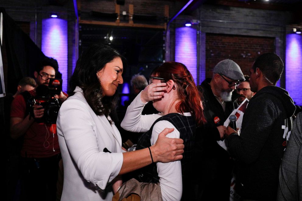 PHOTO: Democratic presidential candidate Rep. Tulsi Gabbard hugs and greets a crying supporter as she holds a Town Hall meeting on Super Tuesday Primary night on March 3, 2020, in Detroit.