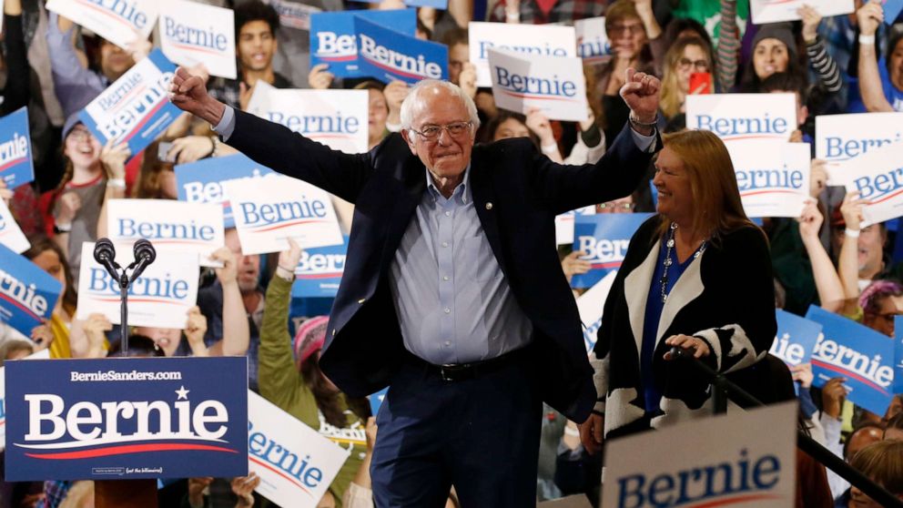 PHOTO: Democratic presidential candidate Sen. Bernie Sanders is accompanied by his wife Jane as he arrives to speak at his Super Tuesday night rally in Essex Junction, Vt., March 3, 2020.