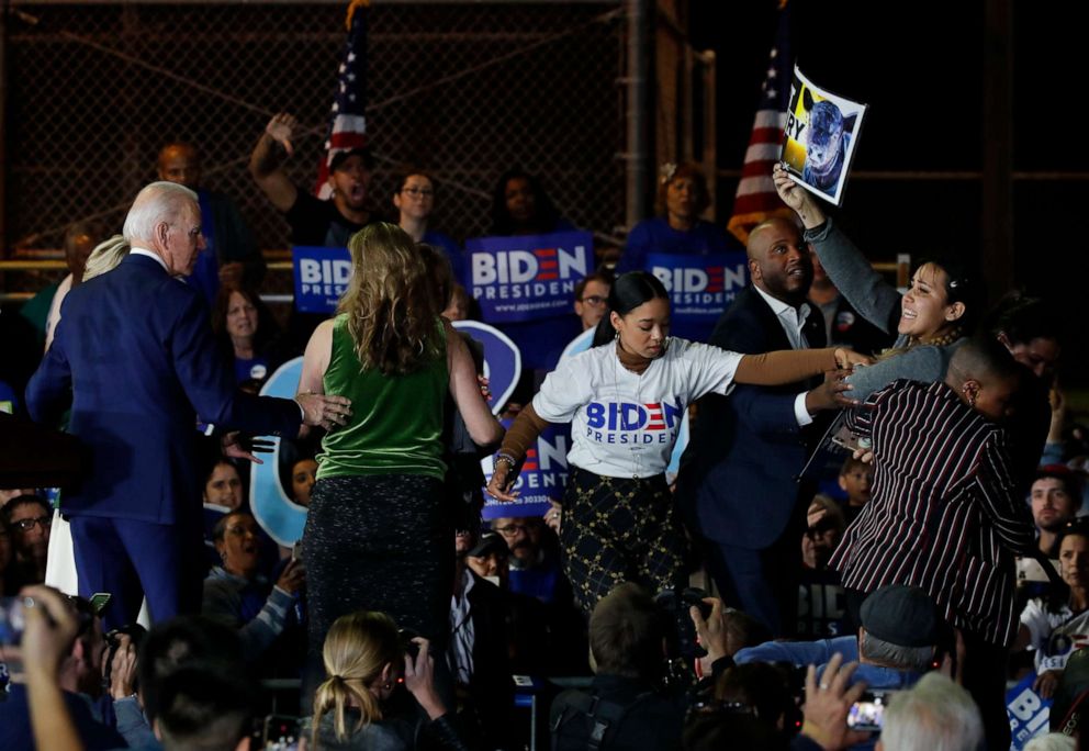 PHOTO: Protesters appear during democratic presidential candidate and former Vice President Joe Biden's Super Tuesday night rally in Los Angeles, March 3, 2020.