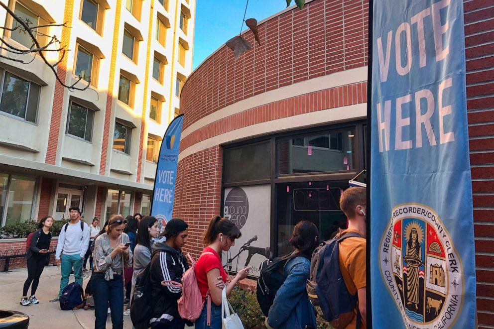 PHOTO: Voters wait on line at a polling station at the University of Southern California on Tuesday, March 3, 2020.
