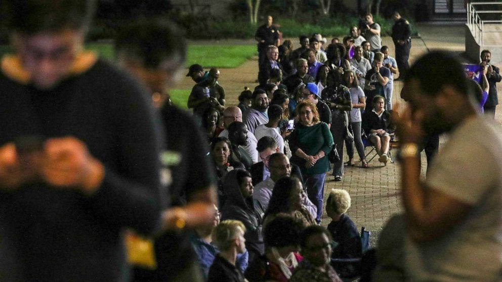 PHOTO: People wait in line to vote Tuesday, March 3, 2020, at Texas Southern University in Houston.