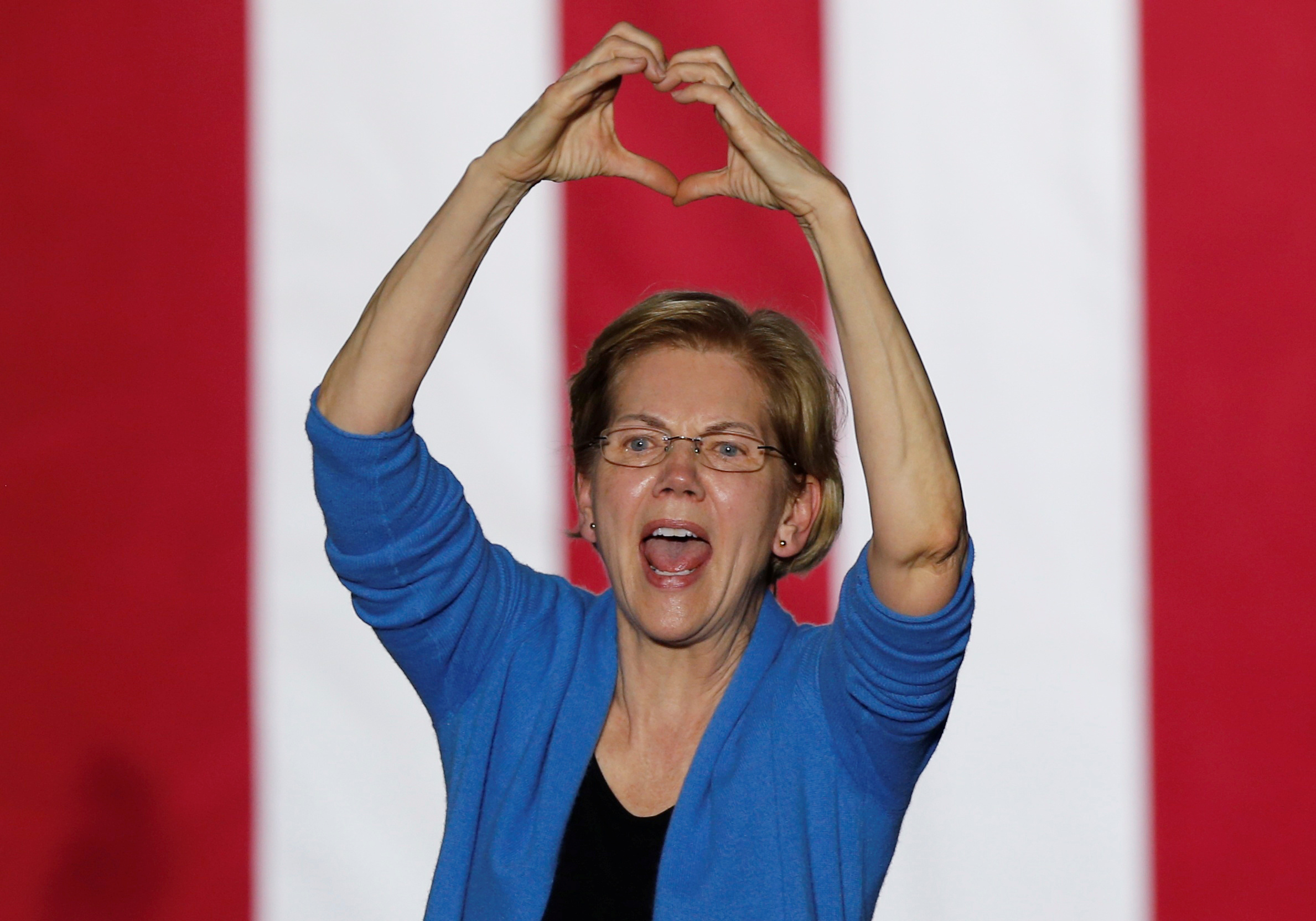 PHOTO: Democratic presidential candidate Sen. Elizabeth Warren makes a heart gesture as she addresses supporters at her Super Tuesday night rally in Detroit, March 3, 2020.