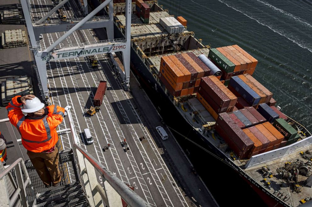 PHOTO: Cargo is offloaded from the Long Beach Express cargo ship at the SSA Terminal in the Port of Oakland, Sept. 16, 2021.