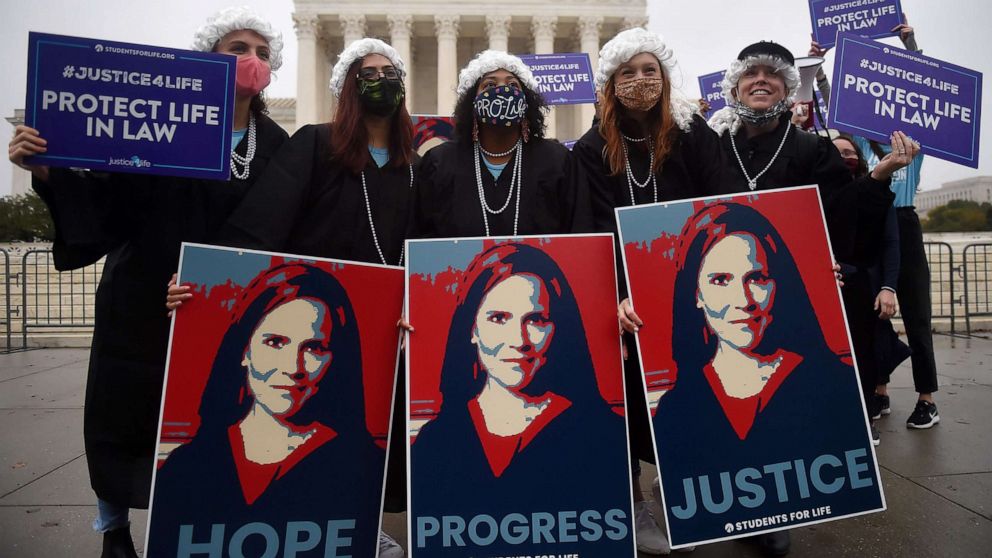 PHOTO: Supporters of President Donald Trump's Supreme Court nominee, Amy Coney Barrett gather in front of the Supreme Court on the first day of her nomination hearing on Oct. 12, 2020, in Washington, D.C.