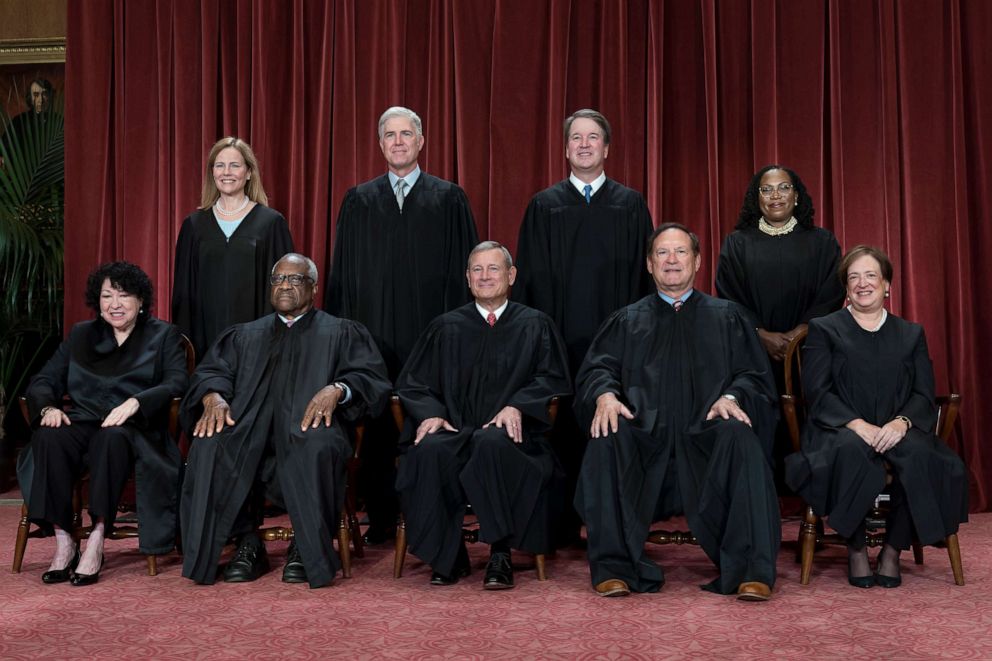 PHOTO: Members of the Supreme Court sit for a new group portrait following the addition of Associate Justice Ketanji Brown Jackson, at the Supreme Court building in Washington, D.C., Oct. 7, 2022. 