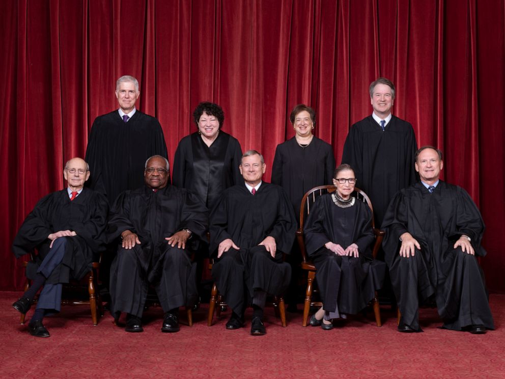 PHOTO: L-R,Justices Stephen G. Breyer and Clarence Thomas, Chief Justice John G. Roberts, Jr., and Justices Ruth Bader Ginsburg and  Samuel A. Alito. Standing, L-R, Justices Neil M. Gorsuch, Sonia Sotomayor, Elena Kagan,and Brett M. Kavanaugh.  