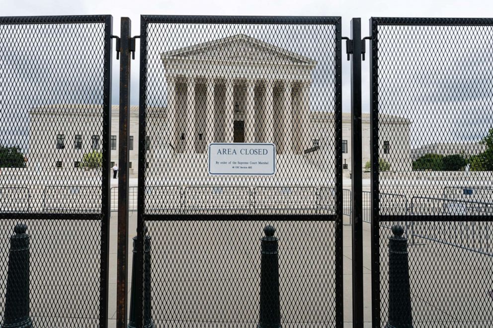 PHOTO: An anti-scaling fence surrounds the U.S. Supreme Court, May 5, 202,2 in Washington, D.C.