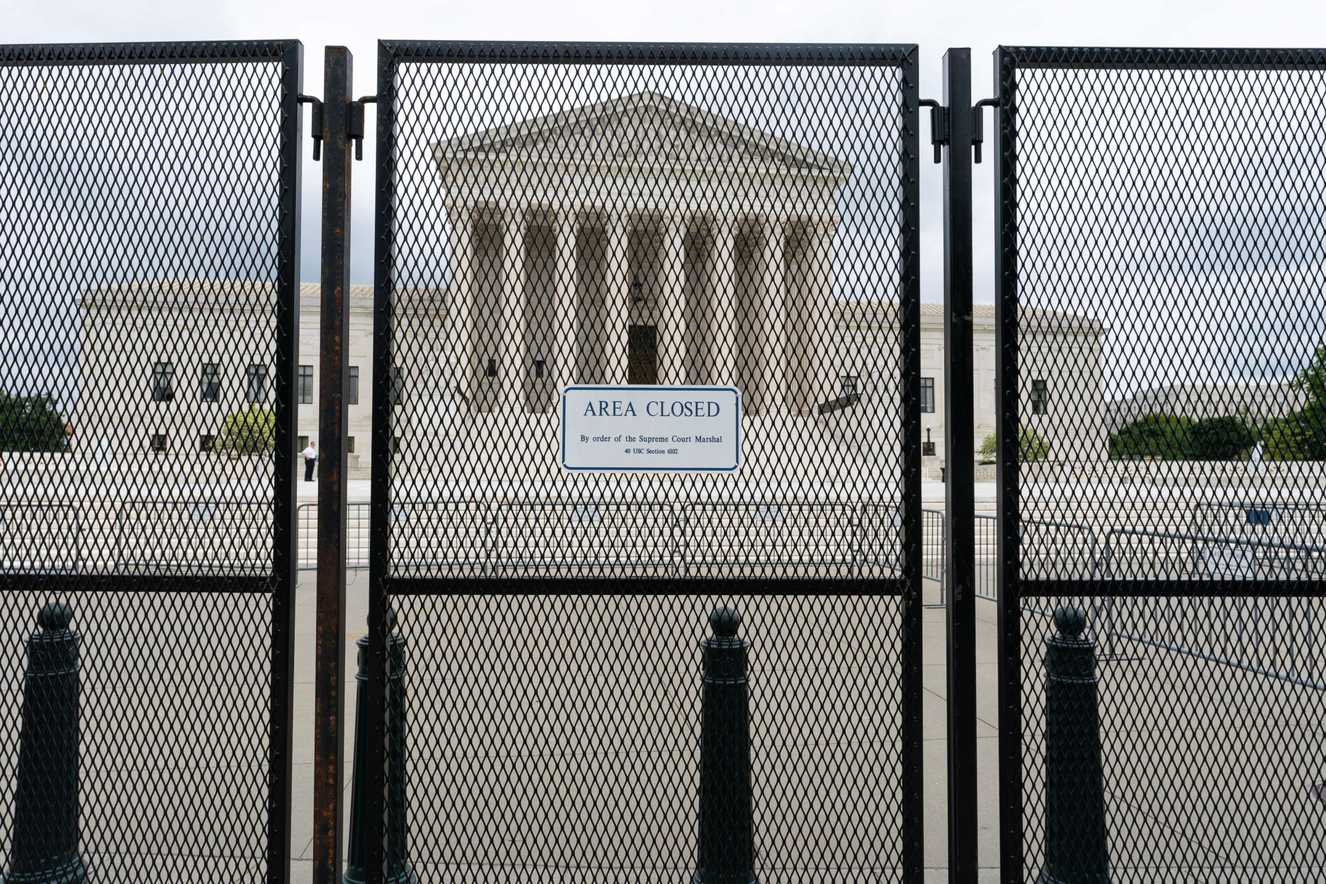PHOTO: An anti-scaling fence surrounds the U.S. Supreme Court, May 5, 2022 in Washington. 