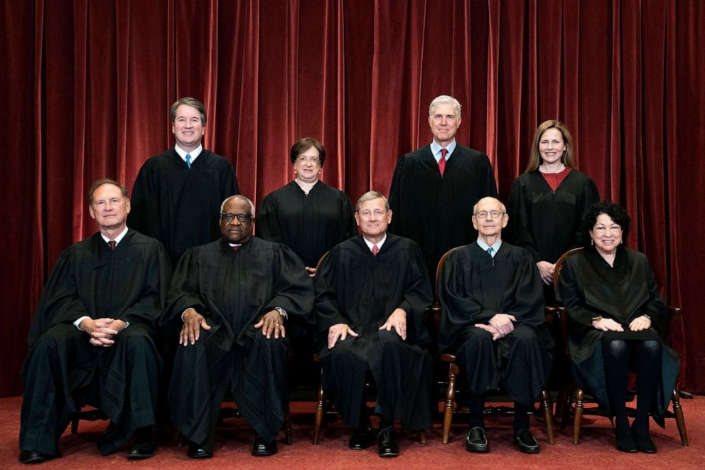 PHOTO: Members of the Supreme Court pose for a group photo at the Supreme Court in Washington, April 23, 2021.