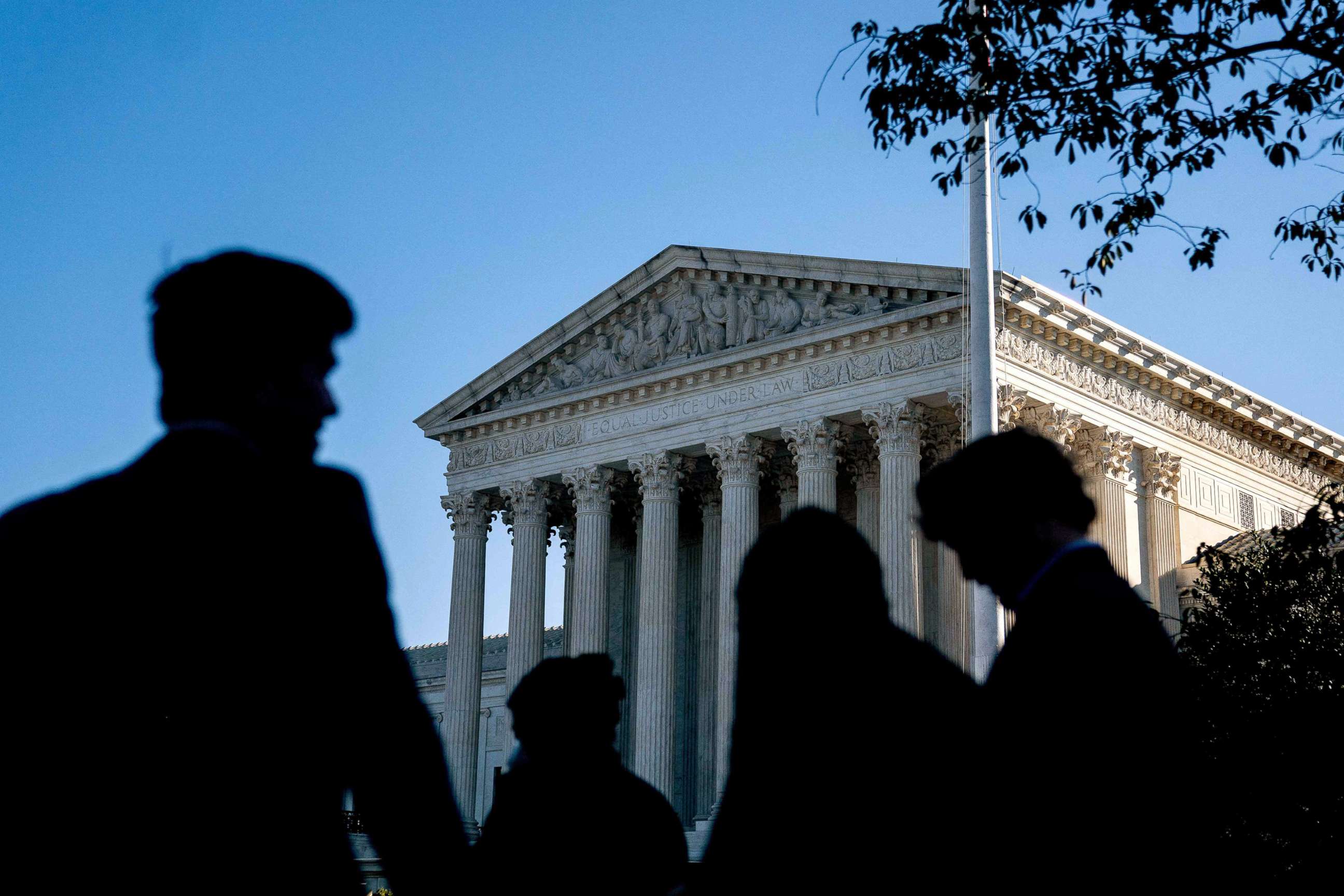 PHOTO: People wait in line outside the U.S. Supreme Court in Washington, D.C., on Oc.11, 2022.