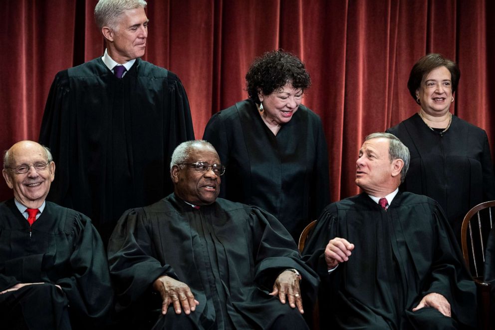 PHOTO: Justices of the United States Supreme Court sit for their official group photo at the Supreme Court on Friday, Nov. 30, 2018, in Washington, D.C.
