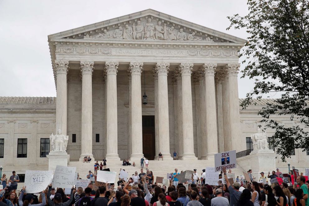 PHOTO: Activists demonstrate in front of the Supreme Court to protest the confirmation vote of Supreme Court nominee Brett Kavanaugh on Capitol Hill, Oct. 6, 2018 in Washington.