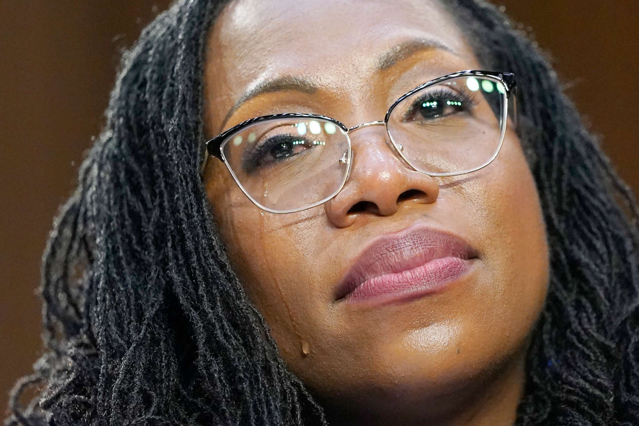 PHOTO: A tear rolls down Supreme Court nominee Ketanji Brown Jackson's cheek as Sen. Cory Booker speaks during her Senate Judiciary Committee confirmation hearing on Capitol Hill in Washington, March 23, 2022.