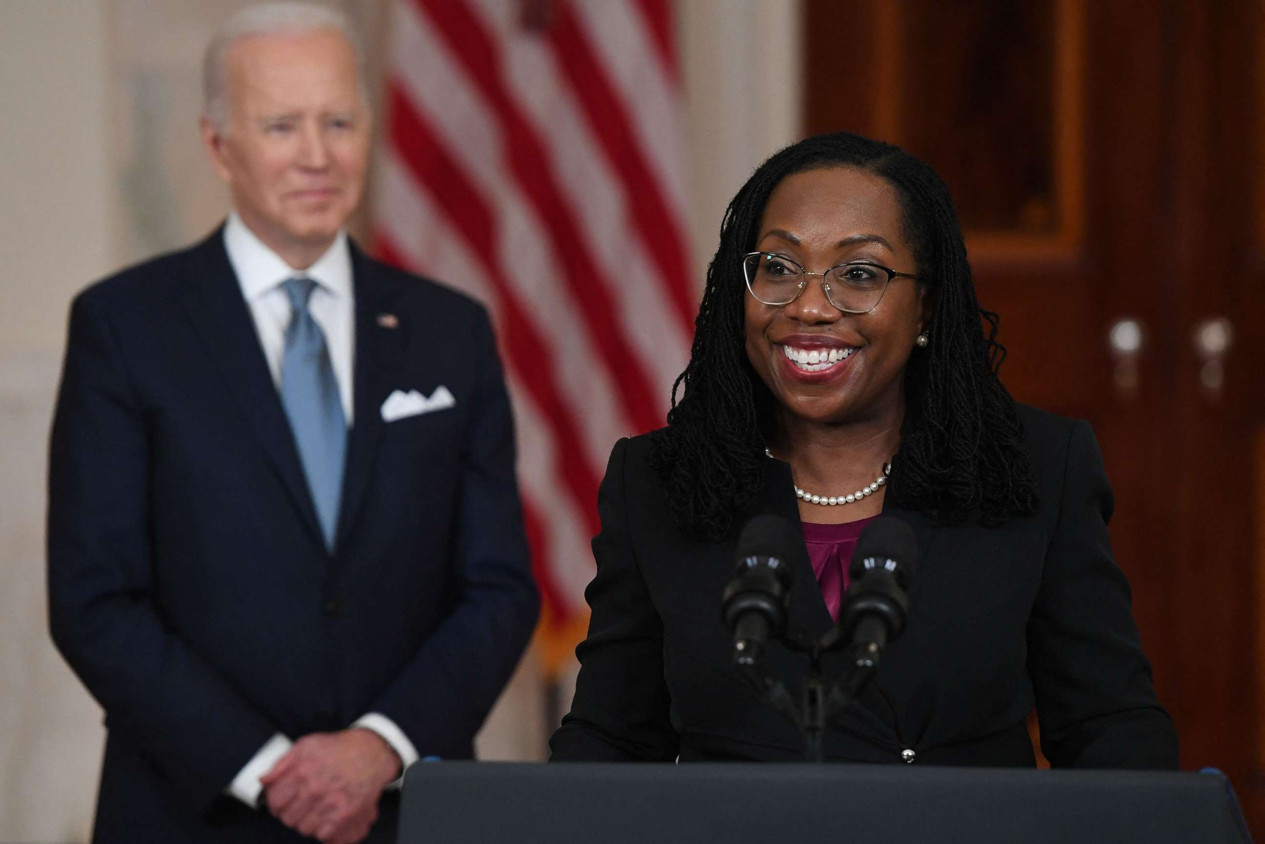 PHOTO: Judge Ketanji Brown Jackson, with President Joe Biden, speaks after she was nominated for Associate Justice of the US Supreme Court, in the Cross Hall of the White House in Washington, Feb. 25, 2022. 