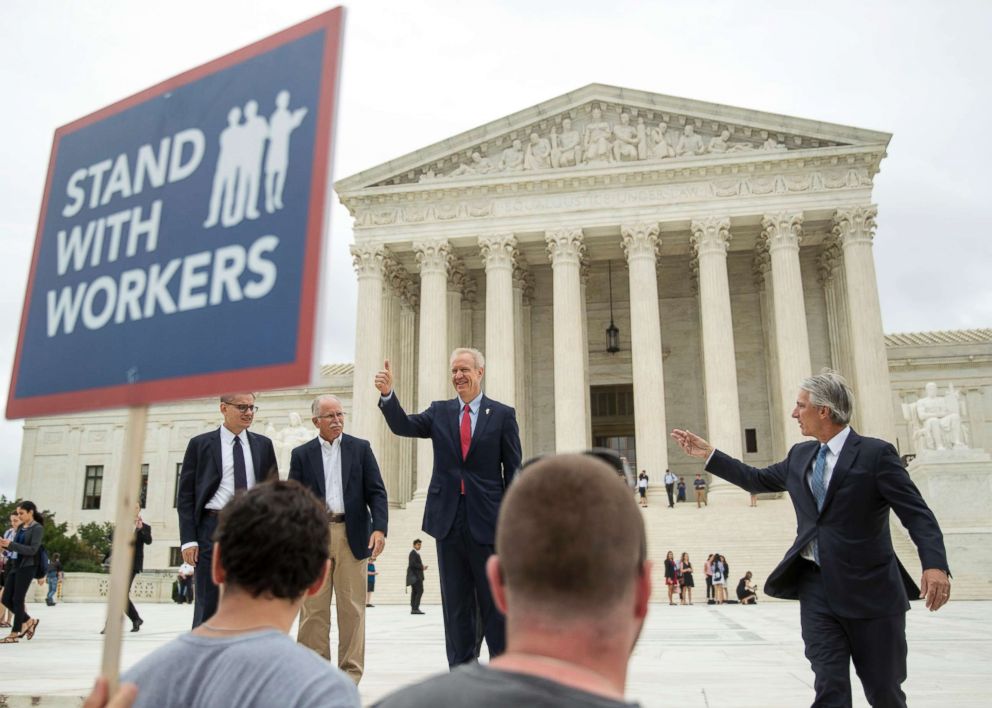 PHOTO: Jacob Huebert, Bruce Rauner, John Tillman, and plaintiff Mark Janus walk out of the the Supreme Court after the court rules in a setback for organized labor that states can't force government workers to pay union fees in Washington, June 27, 2018.