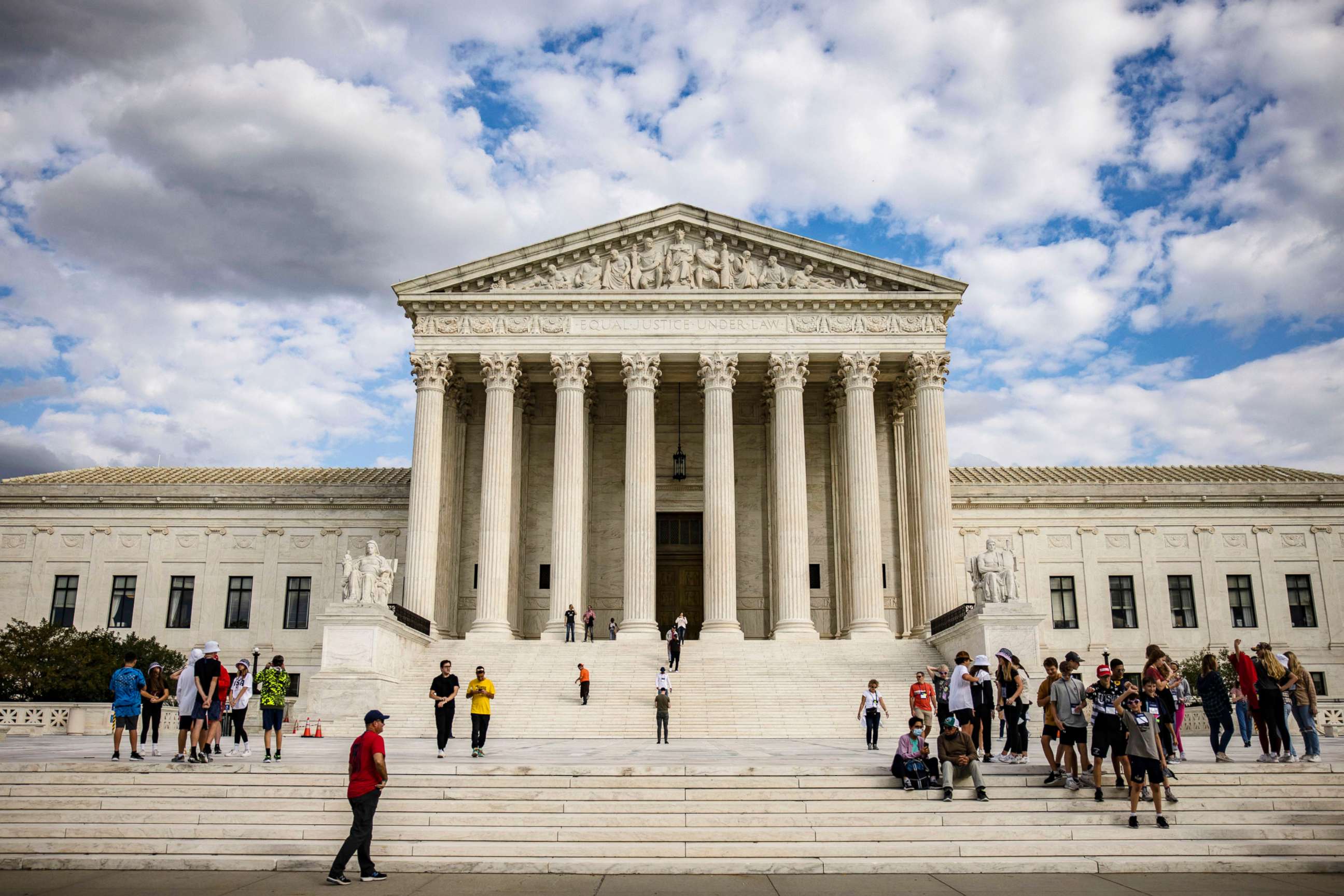 PHOTO: People congregate outside the U.S. Supreme Court building on Capitol Hill in Washington, D.C.,  Oct. 22, 2021.